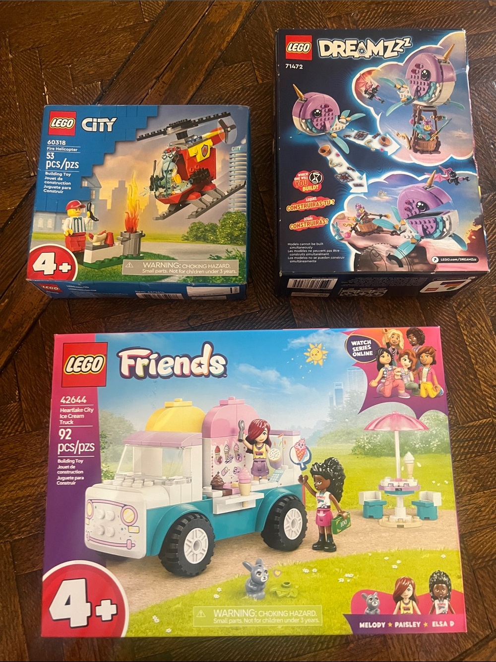 Firm price NIB 3 LEGO sets ice cream truck with characters, helicopter , etc